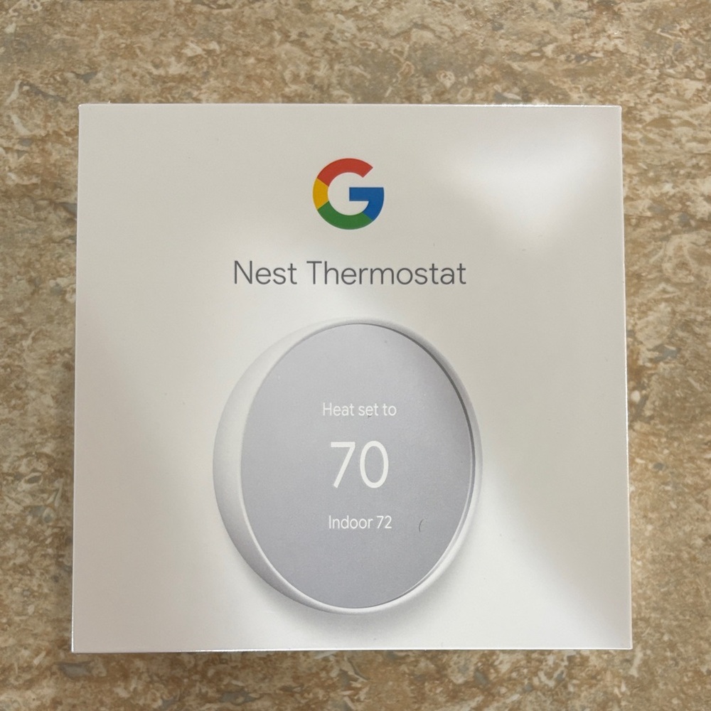 Google Nest Thermostat - Sleek White Design